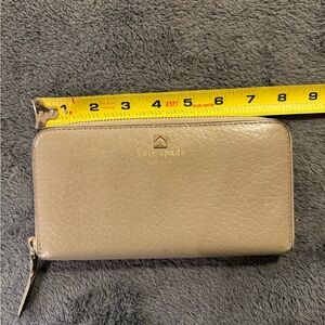 Kate Spade Taupe Pebbled Leather zip around Wallet
